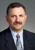 John E. Nemazi